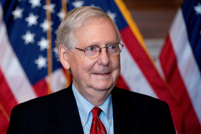 US Senate Majority Leader Mitch McConnell, a Republican from Kentucky, stands for a photo at the US Capitol in Washington, DC, US, November 9, 2020.  (credit: STEFANI REYNOLDS/POOL VIA REUTERS)