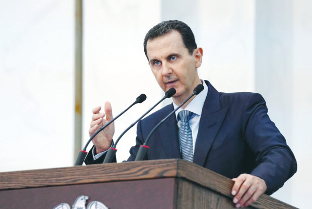 SYRIAN PRESIDENT Bashar Assad addresses members of his country’s parliament in Damascus in August.  (credit: SANA/REUTERS)