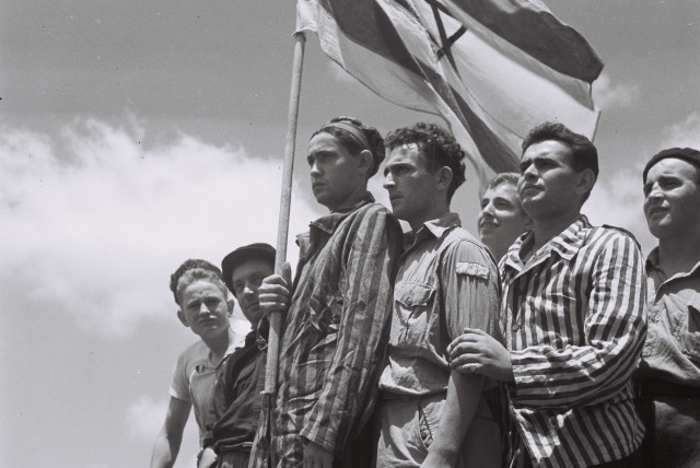 Buchenwald survivors arrive in Haifa to be arrested by the British, July 15, 1945, from ''To the Promised Land'' by Uri Dan (Doubleday, 1987) (credit: PUBLIC DOMAIN)