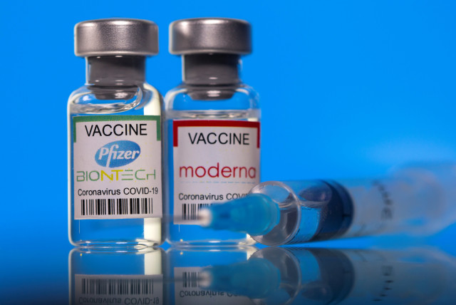 Vials with Pfizer-BioNTech and Moderna coronavirus disease (COVID-19) vaccine labels are seen in this illustration picture taken March 19, 2021.  (credit: REUTERS/DADO RUVIC/ILLUSTRATION/FILE PHOTO)