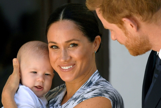 Britain's Prince Harry and his wife, Duchess Meghan with their son Archie (credit: REUTERS)