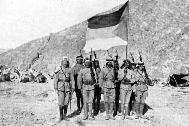 Soldiers in the Arab Army during the Arab Revolt of 1916-1918, carrying the Arab Flag of the Arab Revolt and pictured in the Hejaz. (credit: Wikimedia Commons)