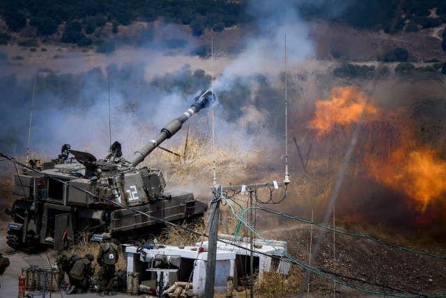  IDF (Israel Defense Force) Artillery Corps seen firing into Lebanon, near the Israeli border with Lebanon, on August 6, 2021.  (credit: BASEL AWIDAT/FLASH90)
