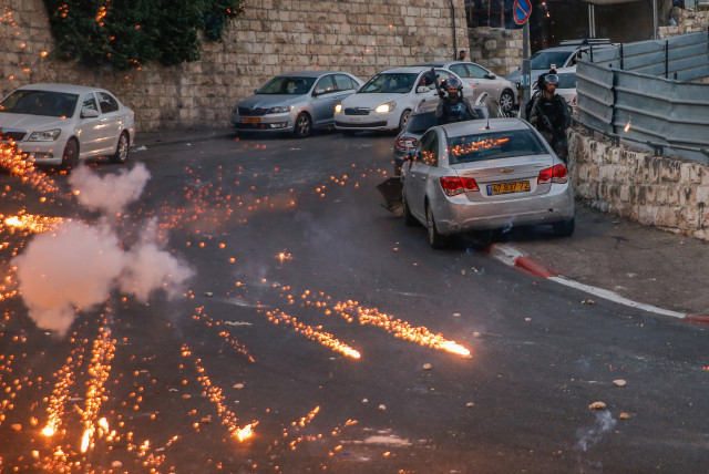  Protesters clash with Israeli police forces after a shop was demolished by Israeli authorities in the East Jerusalem neighbourhood of Silwan, on June 29, 2021.  (credit: JAMAL AWAD/FLASH90)