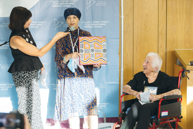  ALICE SHALVI (right) receives her prize: Feminists for a feminist. (credit: Abigail Piperno-Beer)