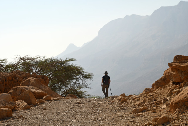 A hiker near the Ein Gedi spring (credit: ITSIK MAROM)