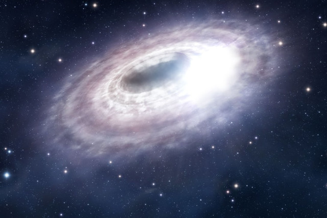  Artistic impression of a material disc with illuminated gas around Sagittarius A*, the supermassive black hole in the center of the Milky Way. (credit: Wikimedia Commons)