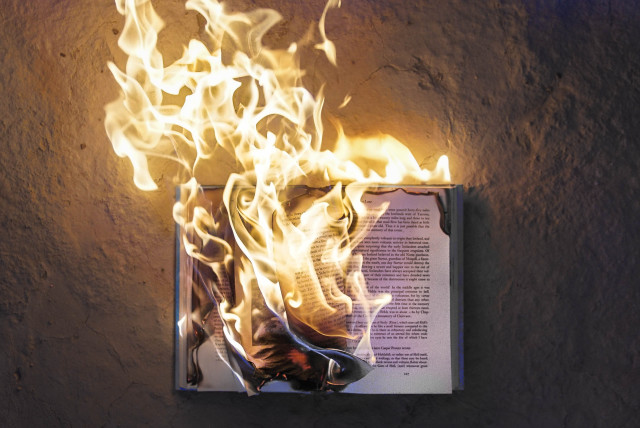  Burning books. (credit: Freddy Kearney/Unsplash)