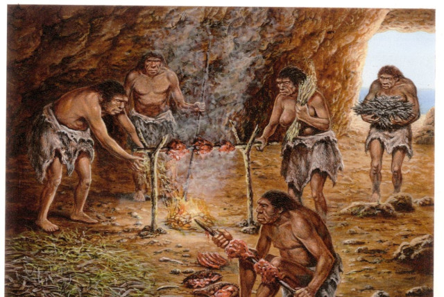  Reconstruction of meat roasting on campfire at the Lazaret Cave, France. (credit: M. A. DE LUMLEY)