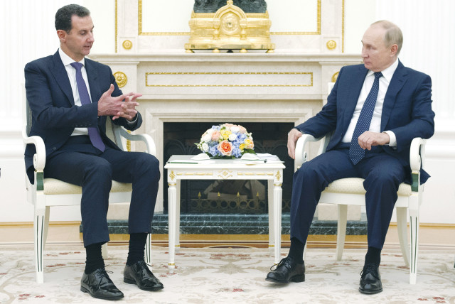  RUSSIAN PRESIDENT Vladimir Putin meets with Syrian President Bashar Assad in Moscow in September. (credit: Sputnik/Kremlin/Reuters)