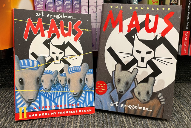  Two books of the graphic novel ''Maus'' by American cartoonist Art Spiegelman are pictured in this illustration, in Pasadena, California, U.S., January 27, 2022. (credit: MARIO ANZUONI/REUTERS)