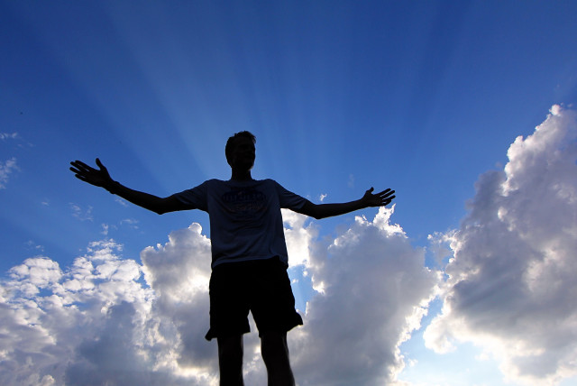  Man stands beneath the heavens. Does he hear the voice of God? (credit: PIXABAY)