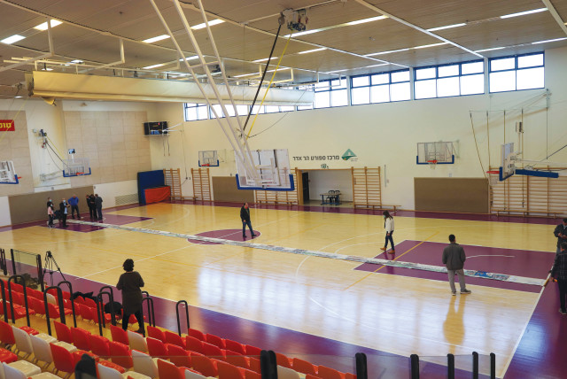  THE ONLY place large enough to measure the megillah was a basketball court. (credit: Rahn Sas)