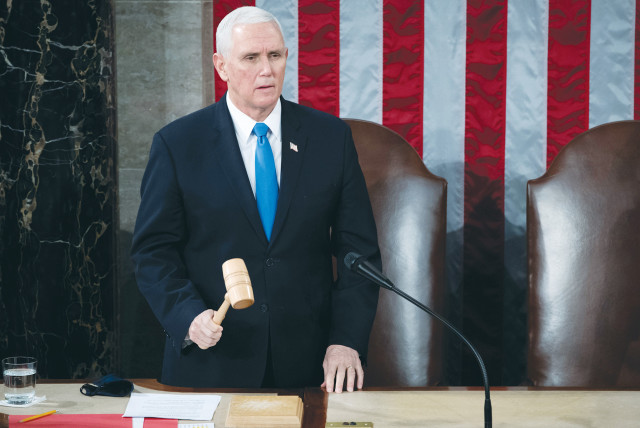  THEN-US VICE President Mike Pence officiates, as a joint session of the House and Senate convenes on January 6, 2021 to confirm the Electoral College votes cast in the November 2020 election.  (credit: SAUL LOEB/REUTERS)