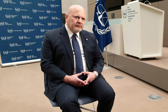  International Criminal Court (ICC) Prosecutor Karim Khan poses during an interview with Reuters at the ICC in The Hague, Netherlands, March 3, 2022.  (credit: REUTERS/CHRISTIAN LEVAUX)