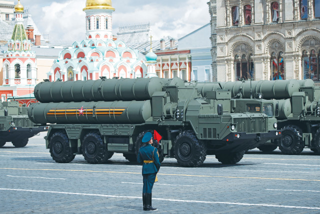  RUSSIAN S-400 ANTI-AIRCRAFT missile systems drive by during a rehearsal for the Victory Day parade in Moscow.  (credit: MAXIM SHEMETOV/REUTERS)