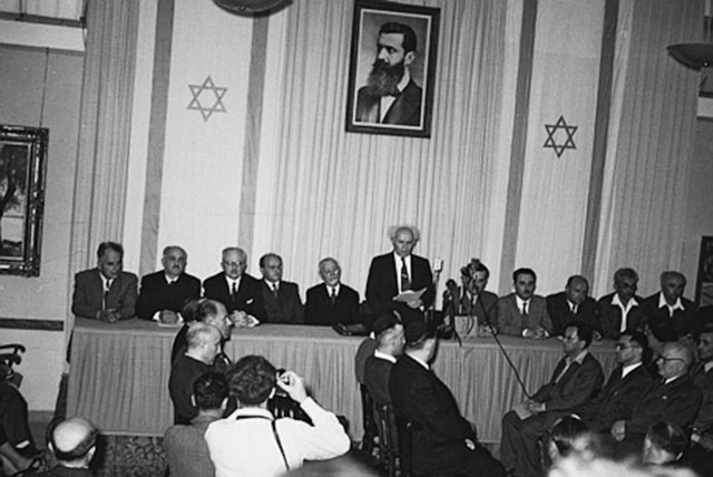  DAVID BEN-GURION reads the Declaration of Independence on Friday, May 14, 1948, in Tel Aviv. (credit: HANS PINN/GPO)