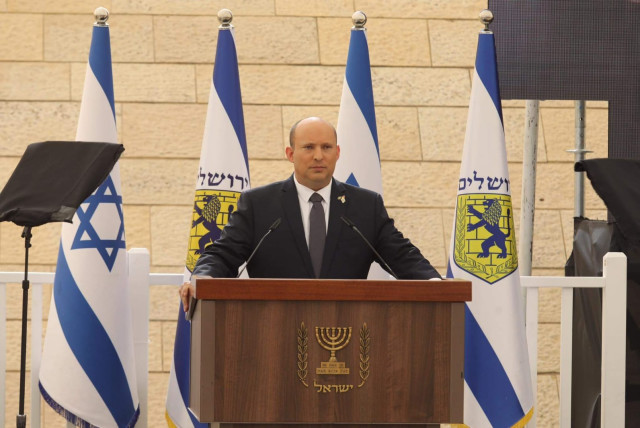  Prime Minister Naftali Bennett speaks at the Yad Labanim Memorial Day ceremony in Jerusalem, May 3, 2022 (credit: MARC ISRAEL SELLEM)