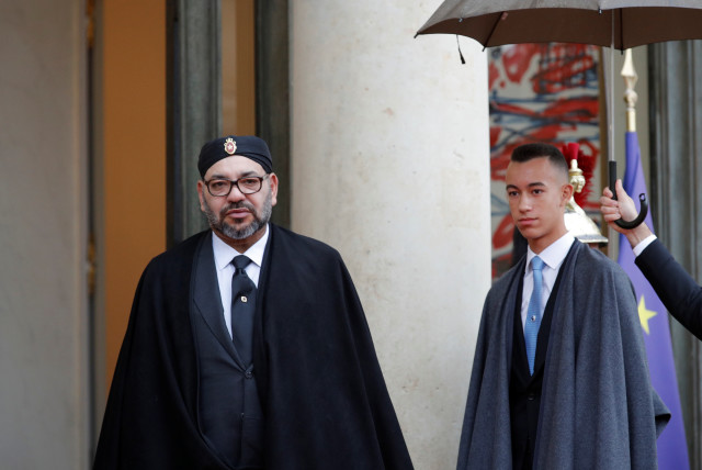  Morocco's King Mohammed VI and his son Crown Prince Moulay Hassan arrive at the Elysee Palace as part of the commemoration ceremony for Armistice Day, 100 years after the end of the First World War, in Paris, France, November 11, 2018. (credit: PHILIPPE WOJAZER/REUTERS)