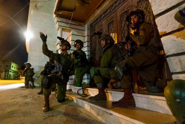  IDF soldiers work to arrest Palestinians as part of Operation Break the Wave (credit: IDF SPOKESPERSON'S UNIT)