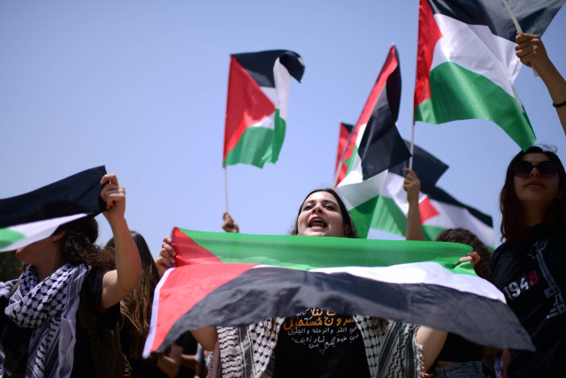 Arab Israelis and Israeli left wing activist students, attend a rally marking the Nakba anniversary at the Tel Aviv University on May 15, 2022 (credit: TOMER NEUBERG/FLASH90)