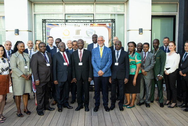  Haim Taib, founder and president of the Mitrelli Group, together with the African ambassadors to Israel and the president and founder of the Ambassadors' Club of Israel, Yitzhak Eldan. (credit: ODED ANTMAN)