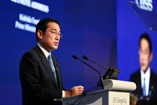  Japan's Prime Minister Fumio Kishida delivers the keynote address at the 19th Shangri-La Dialogue, in Singapore (credit: REUTERS)