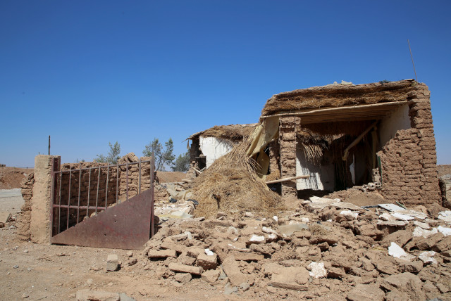  A view shows a damaged house in Umm al-Keif village, near Tal Tamer, in northeastern Syria, June 10, 2022. (credit: STRINGER/ REUTERS)