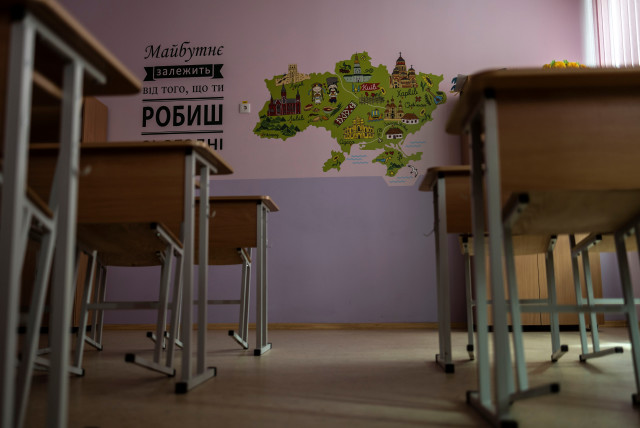  Empty classroom of a local school in Sloviansk, Donetsk (credit: REUTERS)