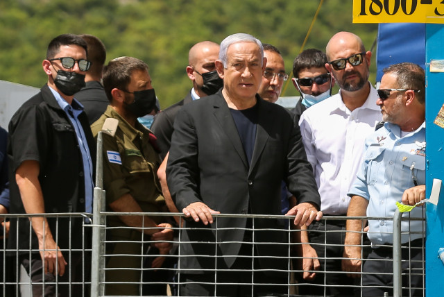  Prime Minister Benjamin Netanyahu visits at the scene on Mt. Meron, in northern Israel on April 30, 2021.  (credit: DAVID COHEN/FLASH 90)