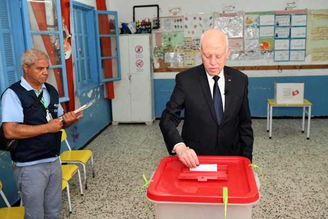  Tunisia's President Kais Saied casts his ballot at a polling station, during a referendum on a new constitution, in Tunis, Tunisia July 25, 2022.  (credit: TUNISIAN PRESIDENT/HANDOUT VIA REUTERS)