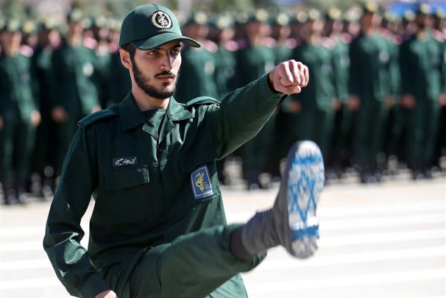  An Iranian Officer of Revolutionary Guards, with Israel flag drawn on his boots, is seen during graduation ceremony, held for the military cadets in a military academy, in Tehran, Iran June 30, 2018 (credit: VIA REUTERS)