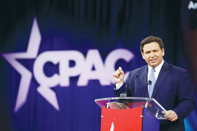  FLORIDA GOVERNOR Ron DeSantis speaks at the Conservative Political Action Conference (CPAC) in Orlando, earlier this year. DeSantis presents a concrete threat to Trump’s primacy in the Republican Party, says the writer (credit: MARCO BELLO/REUTERS)