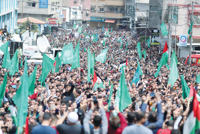  HAMAS SUPPORTERS hold a rally in the northern Gaza Strip, earlier this year. (credit: MOHAMMED SALEM/REUTERS)