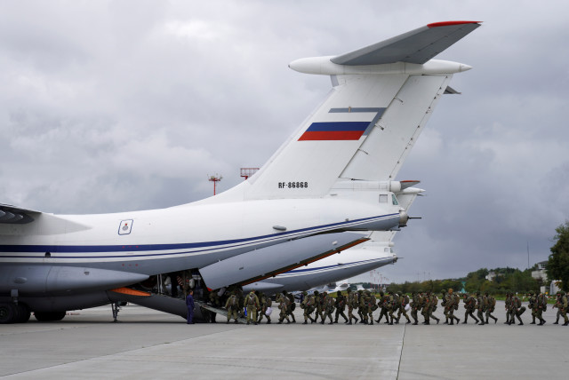 Russian paratroopers board an Ilyushin Il-76 transport plane as they take part in the military exercises ''Zapad-2021'' staged by the armed forces of Russia and Belarus at an aerodrome in Kaliningrad Region, Russia (credit: REUTERS)