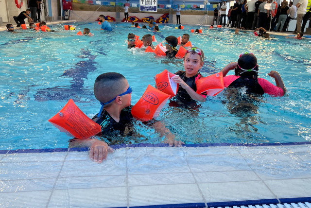  SWIMMING SHOULD be a year-round sport and activity for children of all ages. (photo credit: The Equalizer/Courtesy)