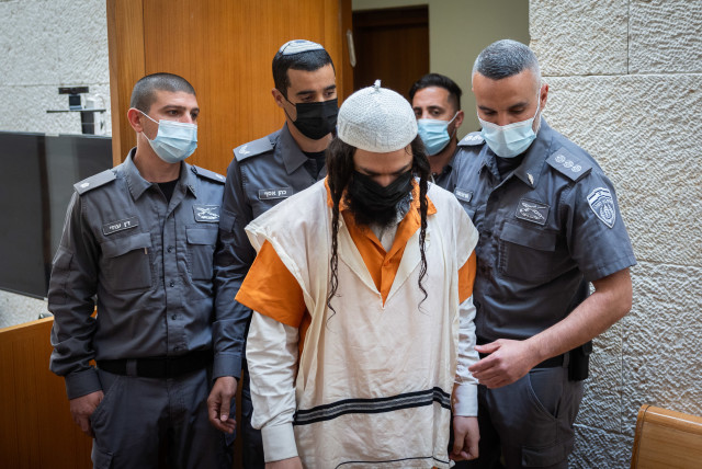 Amiram Ben Uliel, accused of the Duma arson murder in July 2015 where three members of the Dawabshe family were killed, arrives to a court hearing on his appeal, at the Supreme Court in Jerusalem, on March 7, 2022.  (credit: YONATAN SINDEL/FLASH90)