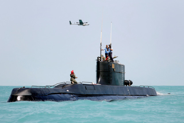 A drone is launched from an Iranian submarine during a military exercise in an undisclosed location in Iran, in this handout image obtained on August 25, 2022.