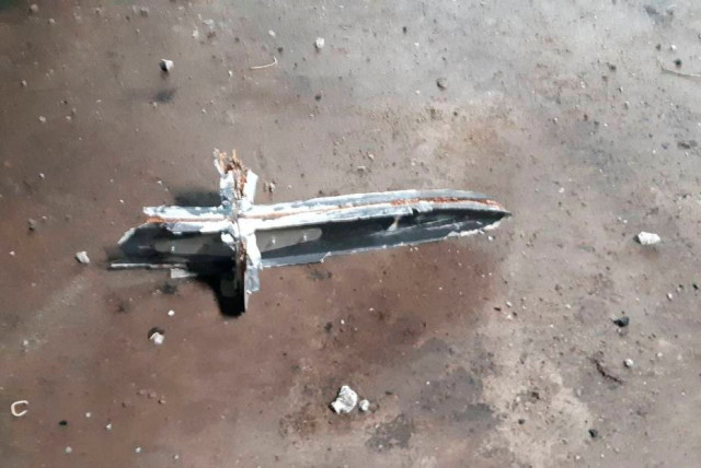  A part of an unmanned aerial vehicle, what Ukrainian military authorities described as an Iranian made suicide drone Shahed-136 and which was shot down near the town of Kupiansk, amid Russia's attack on Ukraine, is seen in Kharkiv region, Ukraine, in this handout picture released September 13, 2022 (credit: THE STRATEGIC COMMUNICATIONS DIRECTORATE OF THE UKRAINIAN ARMED FORCES/HANDOUT VIA REUTERS)