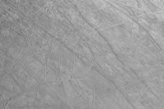  A new picture of Jupiter's moon Europa was shared by NASA's Juno spacecraft in its recent close approach to the moon on Thursday. (credit: NASA/JPL-Caltech/SWRI/MSSS)