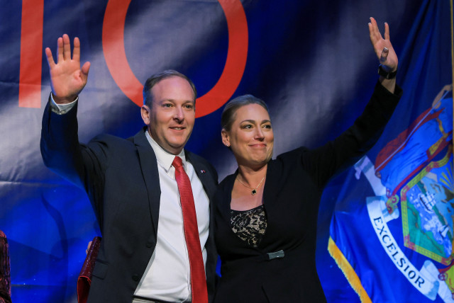  Republican candidate for New York Governor U.S. Rep. Lee Zeldin and his running mate Alison Esposito wave at his midterm election night party in New York, New York, US November 8, 2022. (credit: REUTERS/ANDREW KELLY)