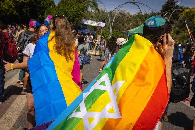  People take part in a rally marking the annual Gay Pride Parade in Jerusalem, on June 3, 2021.  (credit: OLIVIER FITOUSSI/FLASH90)