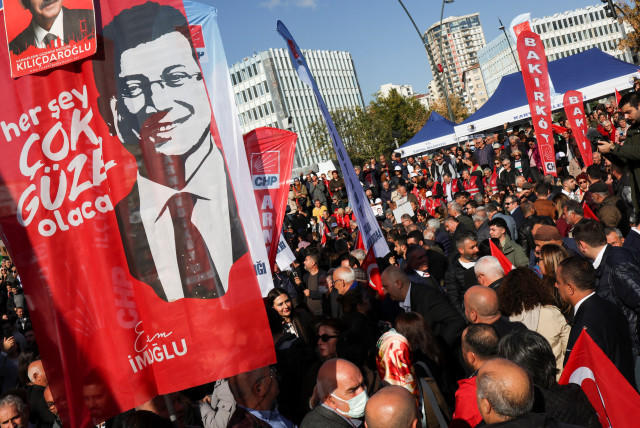  Supporters of Istanbul Mayor Ekrem Imamoglu demonstrate as a Turkish court reaches a verdict in the trial of Imamoglu, who is accused of insulting state officials with comments he made at the time of elections in 2019, in Istanbul, Turkey, November 11, 2022.  (credit: UMIT BEKTAS/REUTERS)