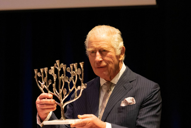  King Charles is gifted a Hanukkah menorah by the founder of JW3 Dame Vivien Duffield during his attendance at a pre-Hanukkah event. (credit: IAN VOGLER/POOL VIA REUTERS)