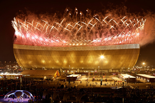  Soccer Football - FIFA World Cup Qatar 2022 - Final - Argentina v France - Lusail Stadium, Lusail, Qatar - December 18, 2022 General view of a pyrotechnic display pictured from outside the stadium after the match (credit: HAMAD I MOHAMMED/REUTERS)