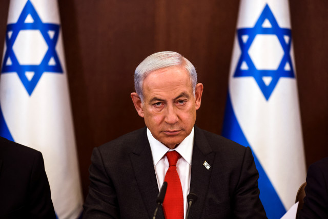  Israeli Prime Minister Benjamin Netanyahu convenes a weekly cabinet meeting at the Prime Minister's office in Jerusalem, January 8, 2023 (credit: REUTERS/Ronen Zvulun/Pool)