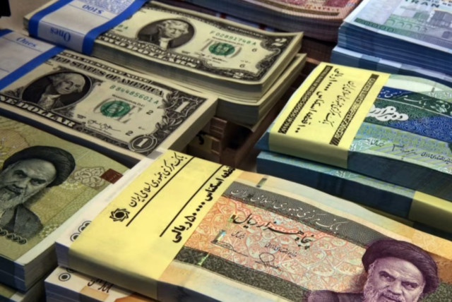 Iran's national currency along with US currency. (credit: Wikimedia Commons)