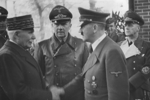  Philippe Pétain shakes hands with Hitler (credit: Heinrich Hoffman/Wikimedia Commons)