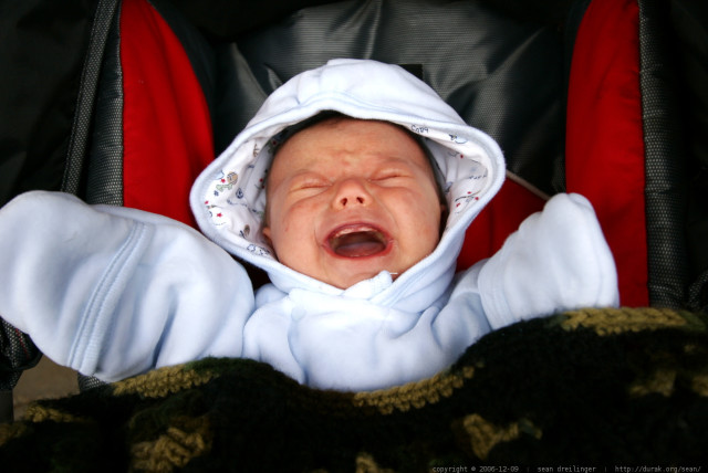  Illustrative image of a crying baby in a stroller. (credit: FLICKR)