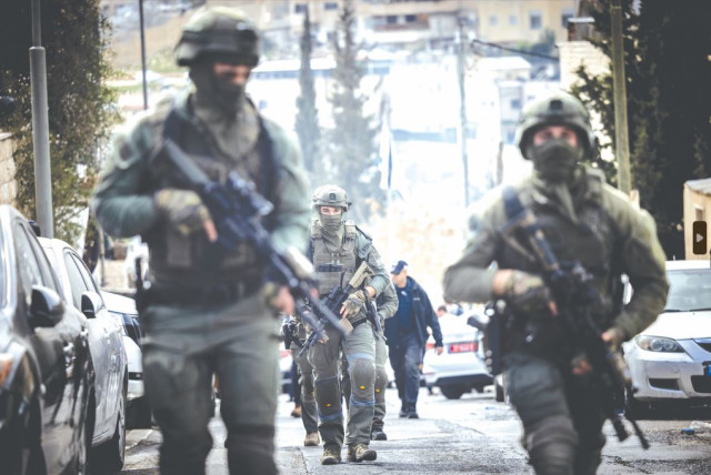  SECURITY FORCES at the scene following the terror attack in the City of David, in eastern Jerusalem, on January 28.  (credit: YONATAN SINDEL/FLASH90)
